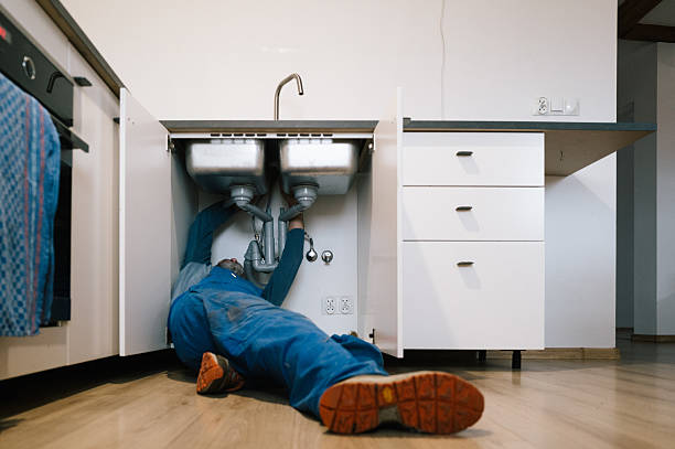 Professional Emergency Plumber technician working in Ashton, MD